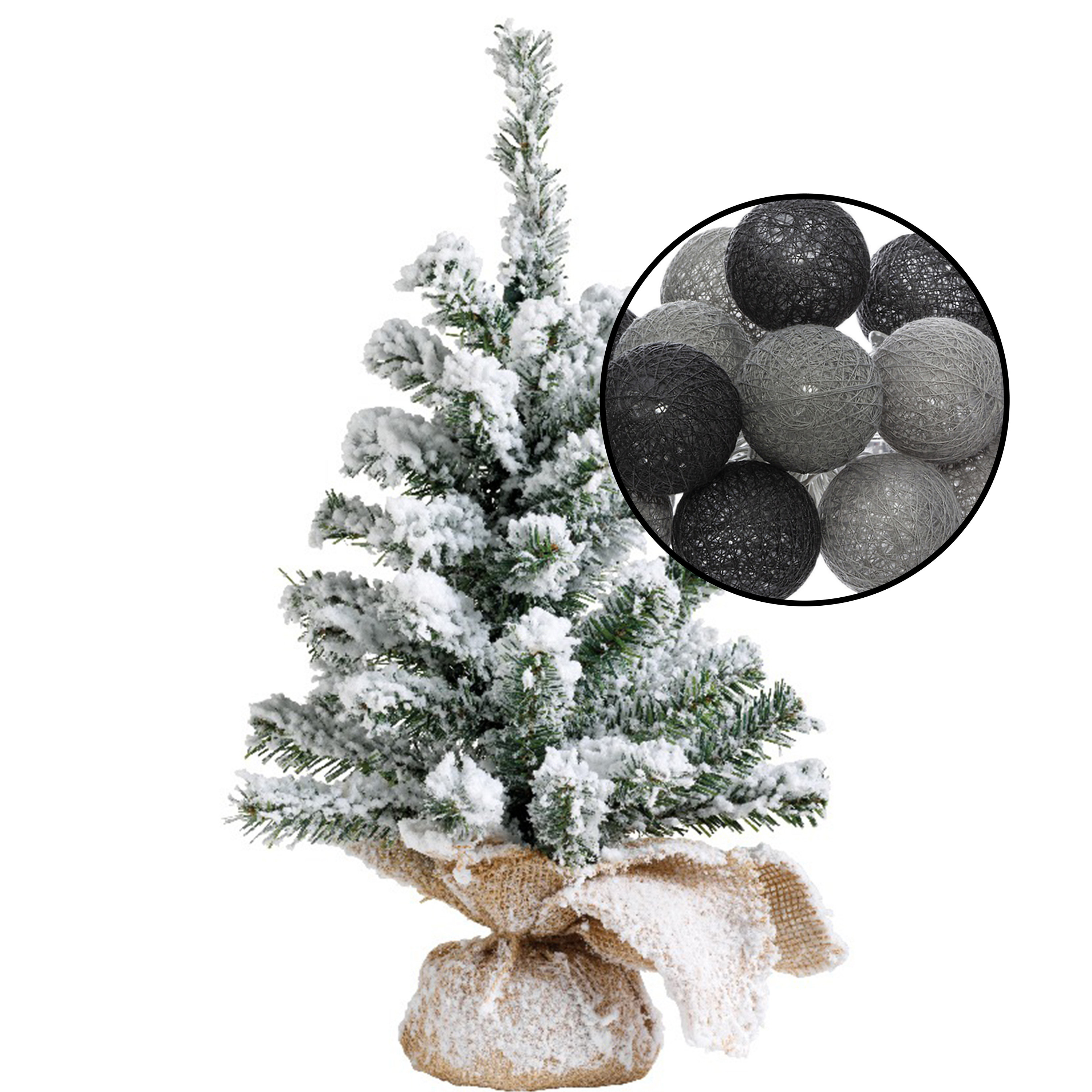 Mini kerstboom besneeuwd met verlichting in jute zak H45 cm zwart-grijs